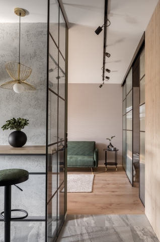Steel look glazen wand als roomdivider
